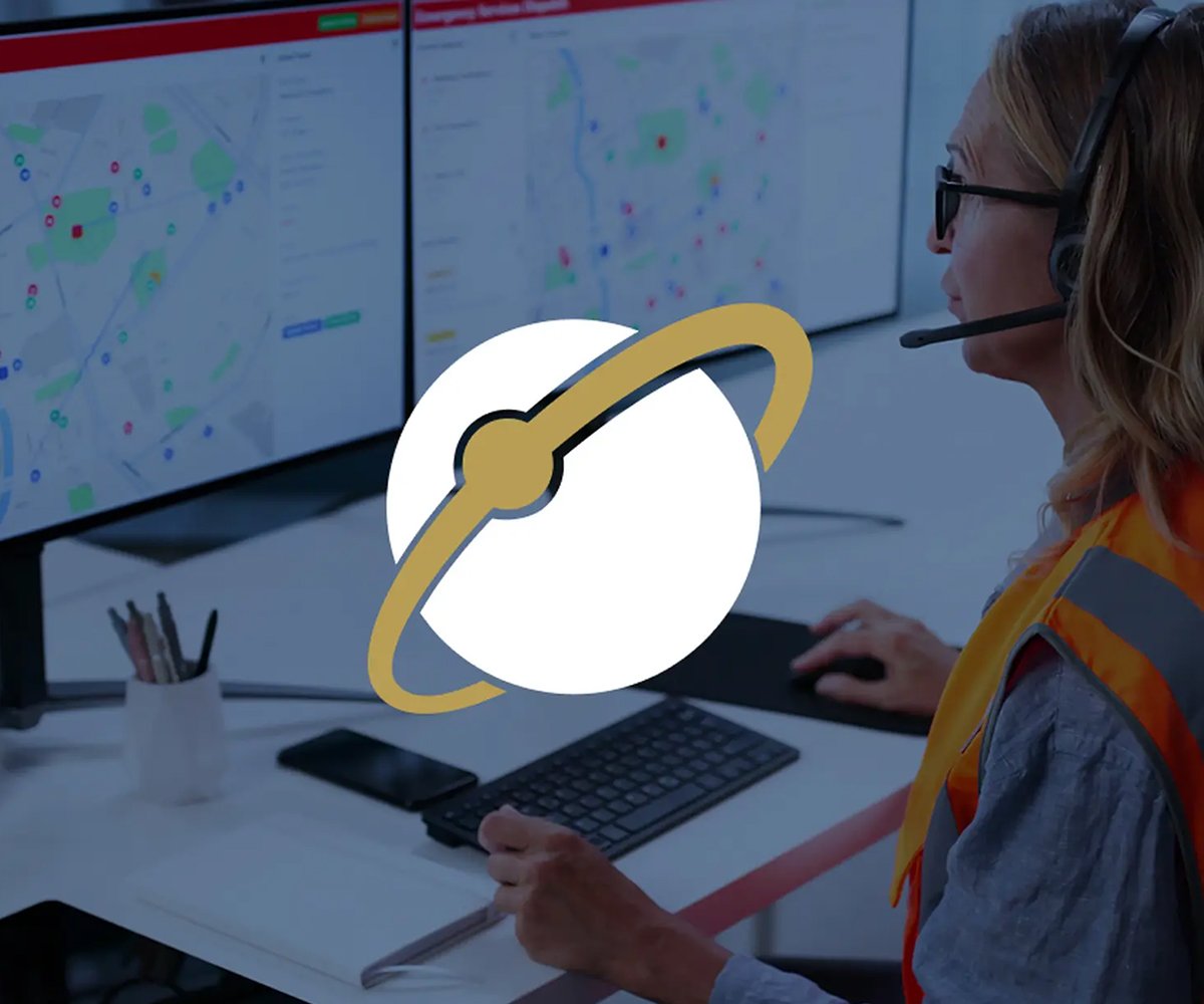 Person wearing a headset using a computer with multiple data screens, overlaid by a circular tech-style logo