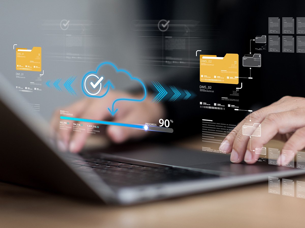Cloud icon with progress indicator and file cards overlaying a laptop, showing cloud data transfer.