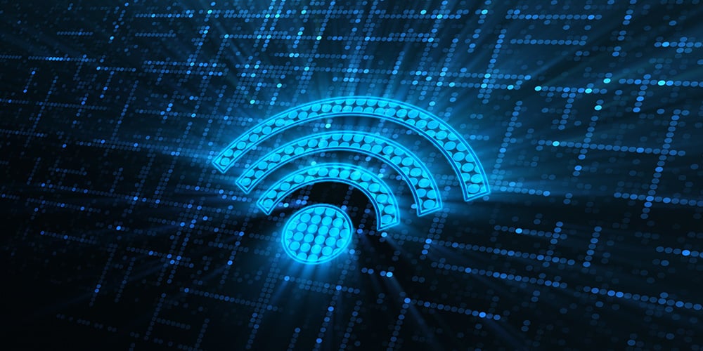 Stylised Wi‑Fi symbol glowing over a digital grid.