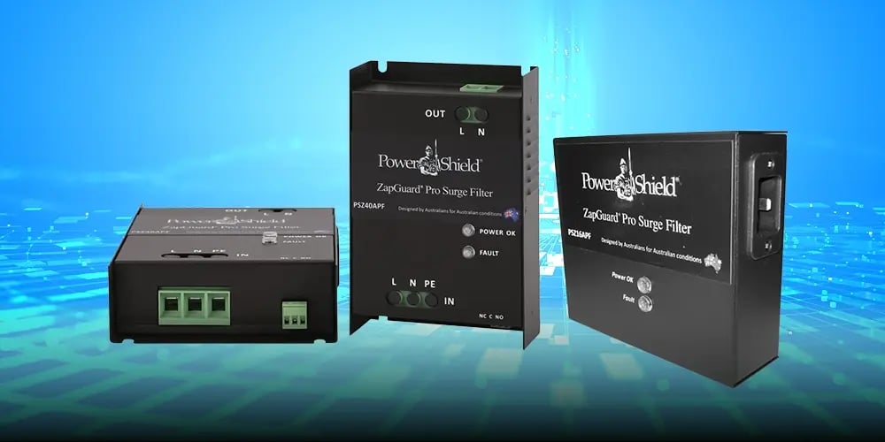 Three black PowerShield ZapGuard Pro Surge Filters are displayed against a blue digital background. The filters have labeled connectors and indicator lights.