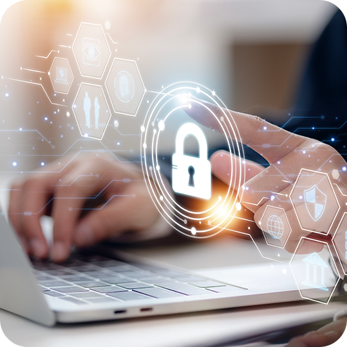 Person working at laptop with security and digital graphics